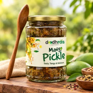 Doodhras Mango Pickle in a glass jar with a wooden spoon, showcasing traditional homemade-style mango pickle.